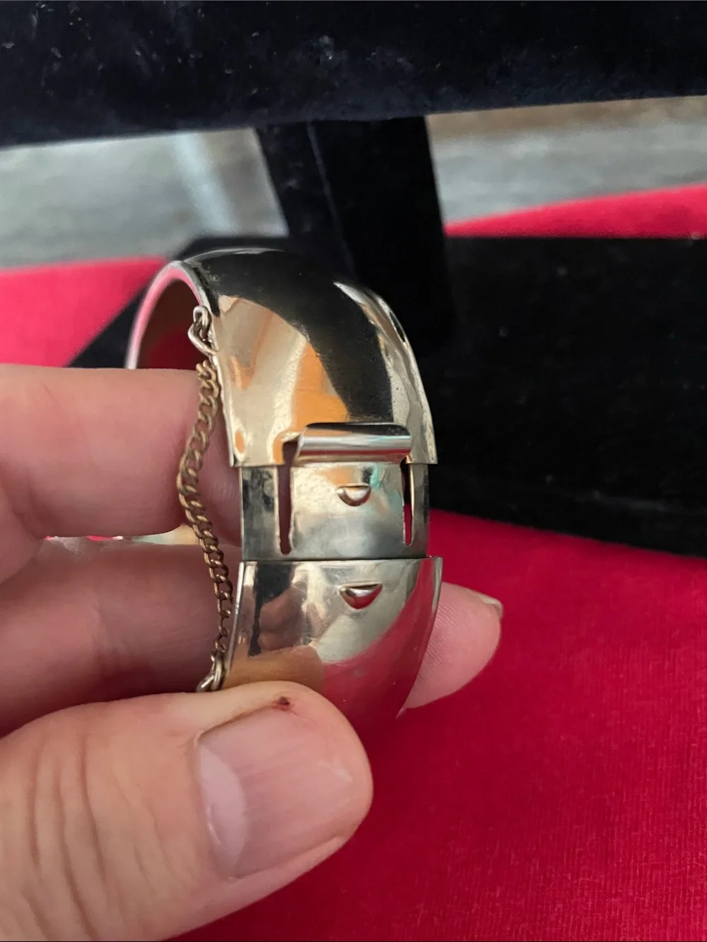 Polished Silver-Tone Hinged Bangle Bracelet with Safety Chain
